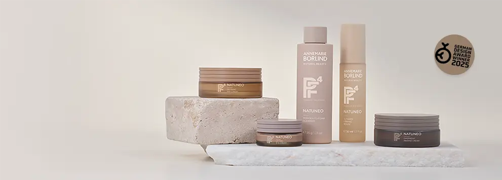 ANNEMARIE BÖRLIND NATUNEO Pflegeserie mit Creme, Lotion und Serum auf Naturstein, German Design Award 2025 Gewinner