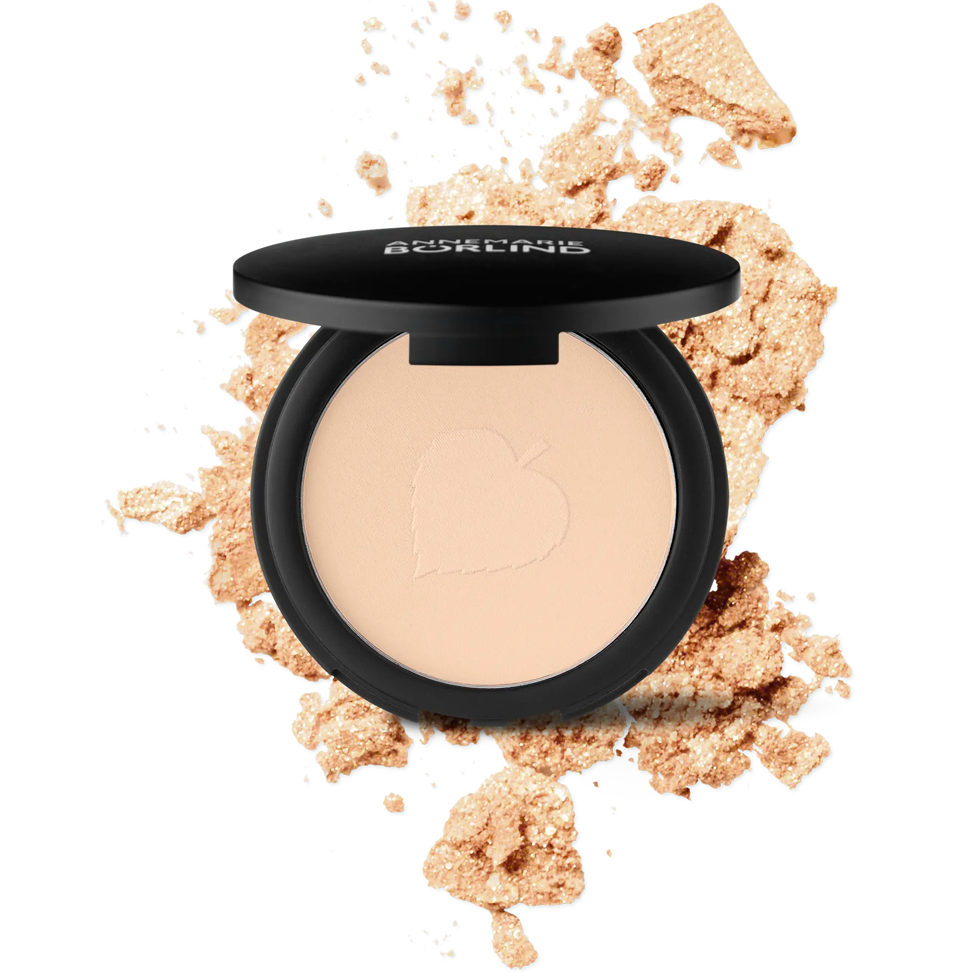 ANNEMARIE BÖRLIND Compact Powder Teint in hellem Farbton mit Apfel-Prägung und Puderkrümeln im Hintergrund