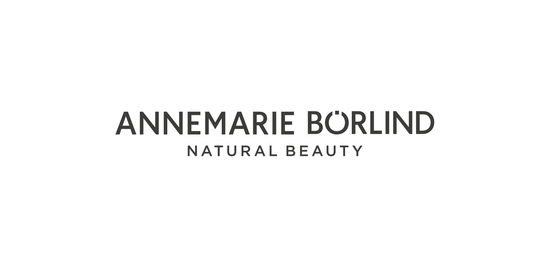 Schwarzer Hintergrund mit weißem Schriftzug ANNEMARIE BÖRLIND NATURAL BEAUTY in Großbuchstaben