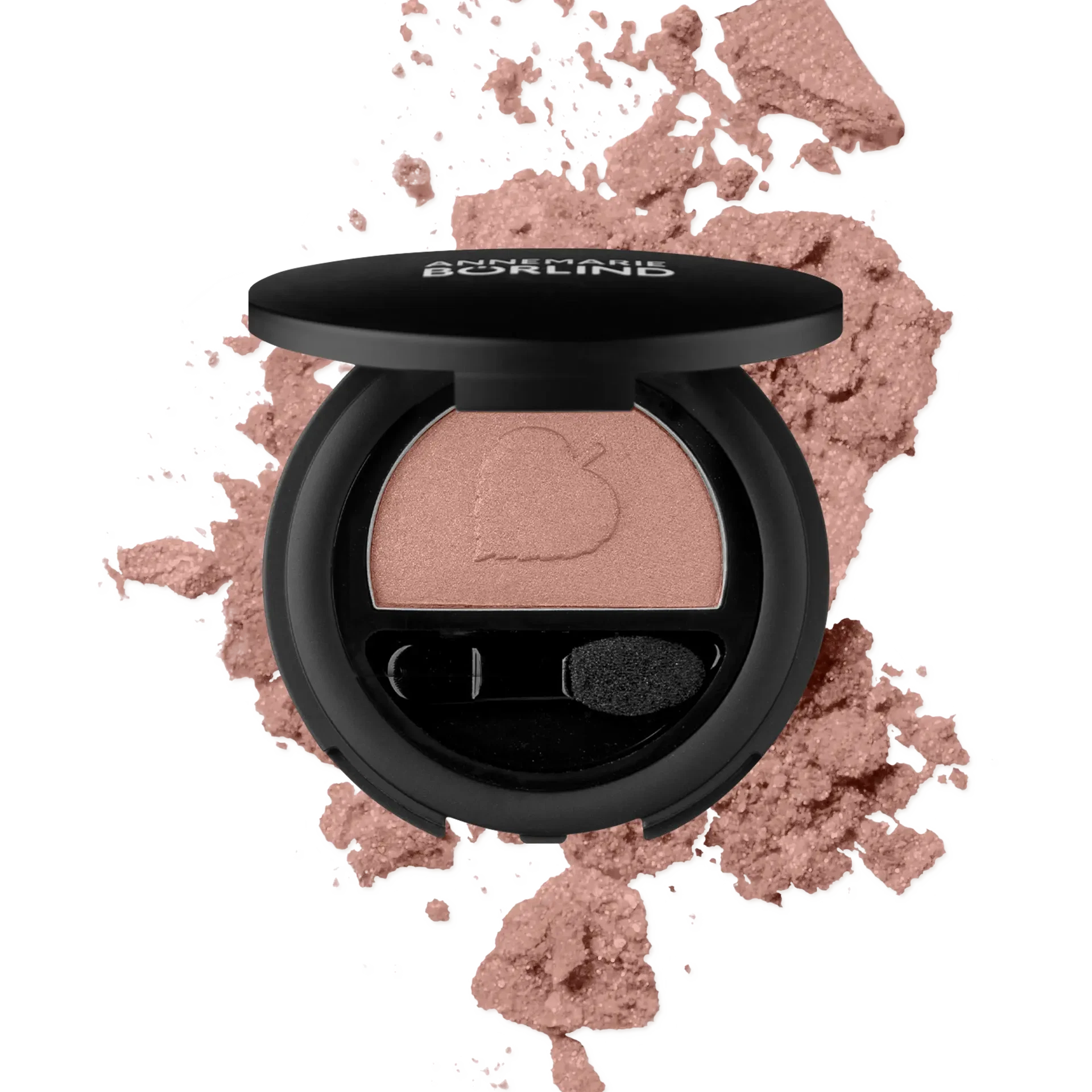 ANNEMARIE BÖRLIND Lidschatten in Rosy Glow mit Applikator und zerbröseltem Puder im Hintergrund