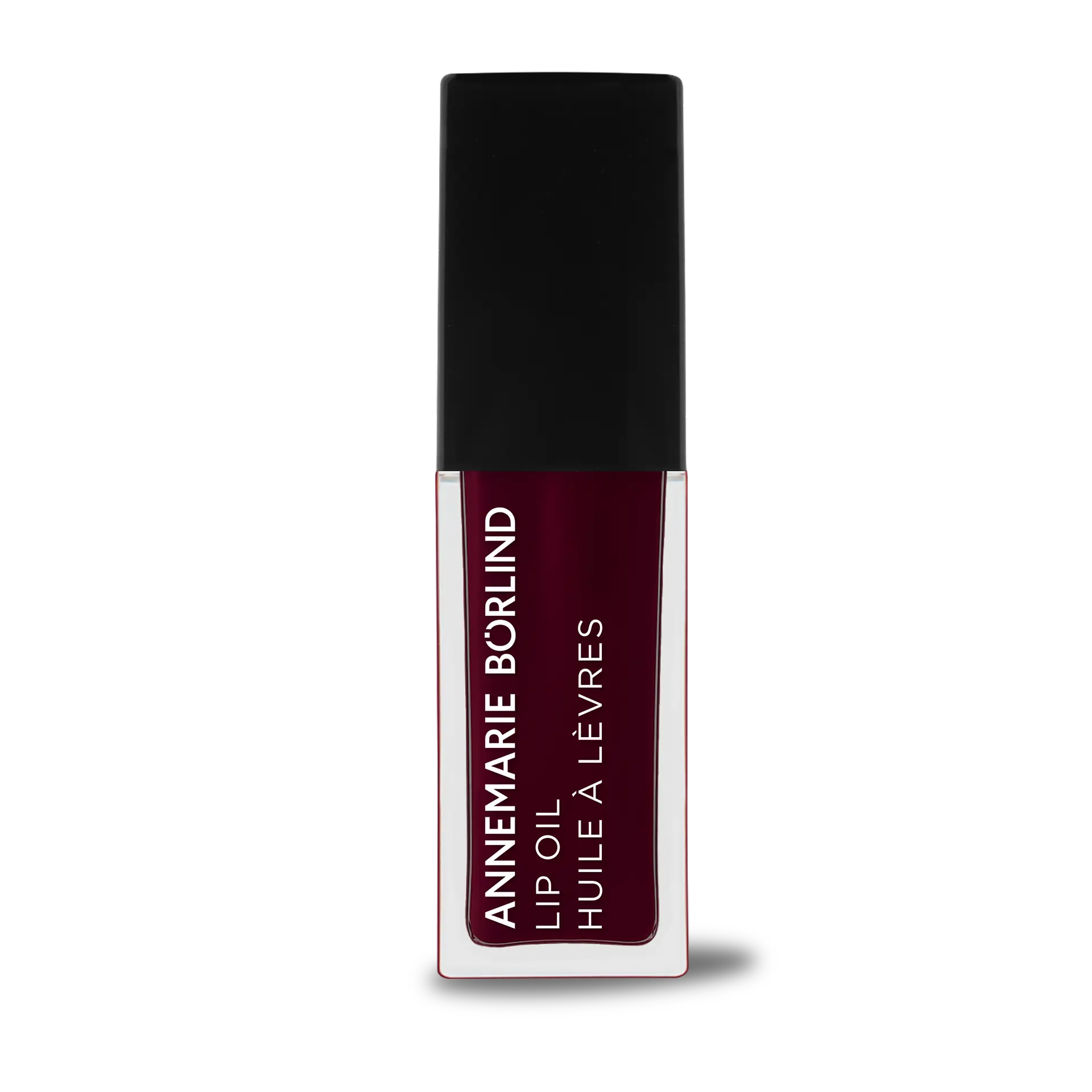 ANNEMARIE BÖRLIND Lip Oil Midnight Dahlia in durchsichtiger Tube mit schwarzem Deckel und weißer Schrift