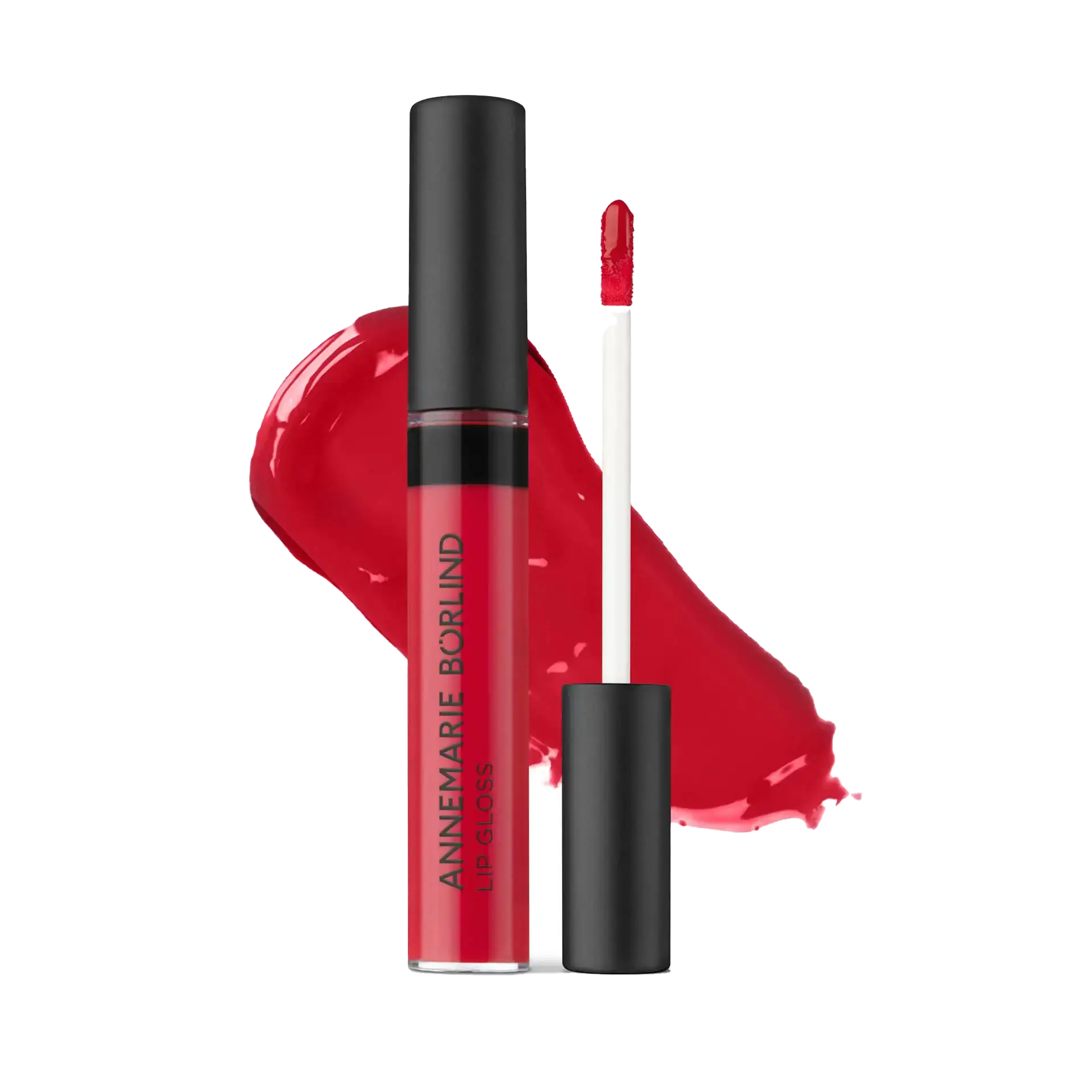 ANNEMARIE BÖRLIND Lip Gloss in Rot mit Applikator vor rotem Gloss-Fleck auf weißem Hintergrund