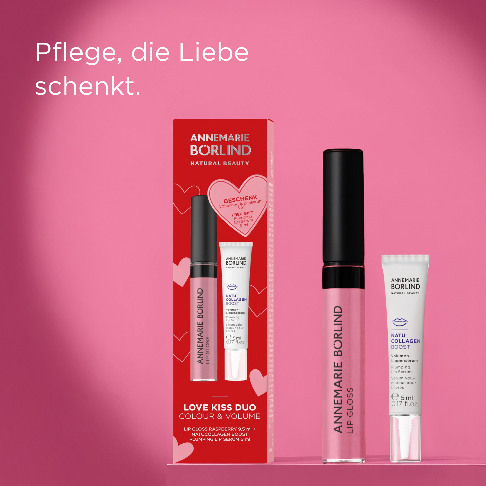 ANNEMARIE BÖRLIND Lipgloss in zartem Rosa und Lippenserum mit feuchtigkeitsspendender Hyaluronsäure und veganer Formel vor rosa Hintergrund