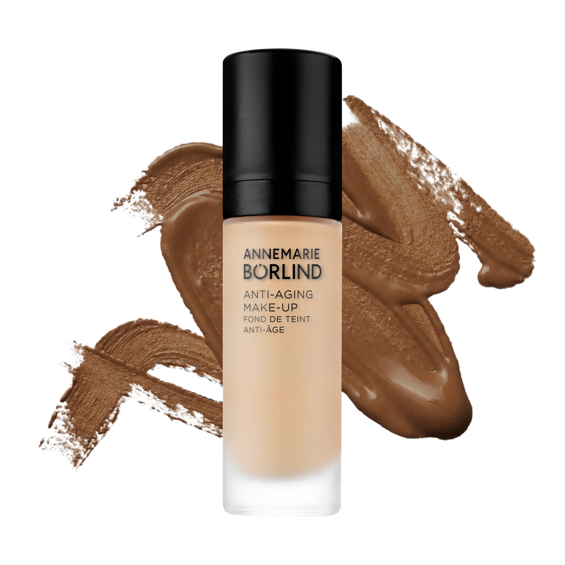 ANNEMARIE BÖRLIND Anti-Aging Make-up in Flasche vor karamellfarbenem Make-up-Swatch
