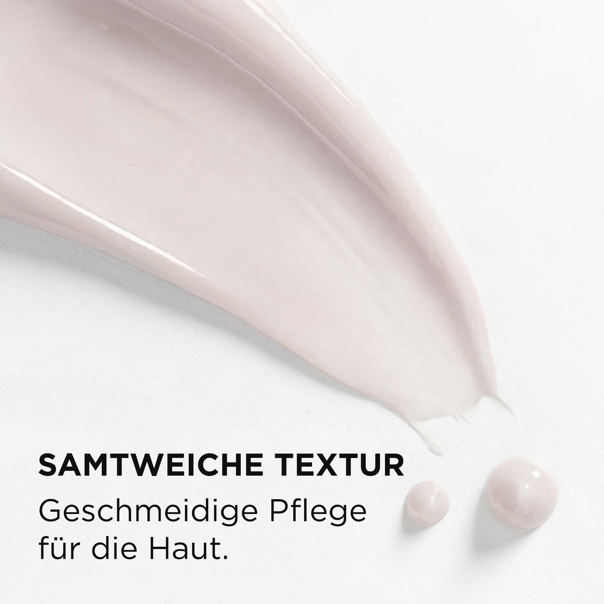 Cremige, hellbeige Textur mit zwei kleinen Tropfen mit Beschreibung