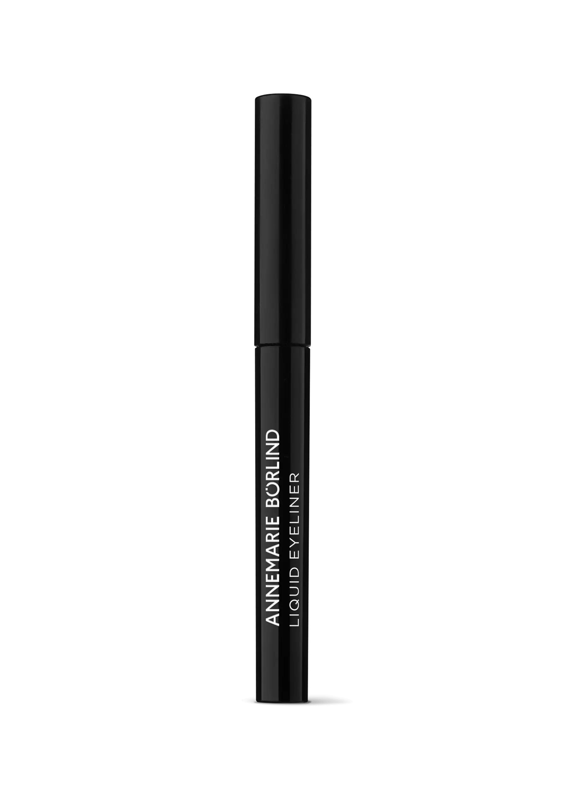 ANNEMARIE BÖRLIND Liquid Eyeliner in schwarzer, schlanker 2-ml-Flasche vor schwarzem Hintergrund