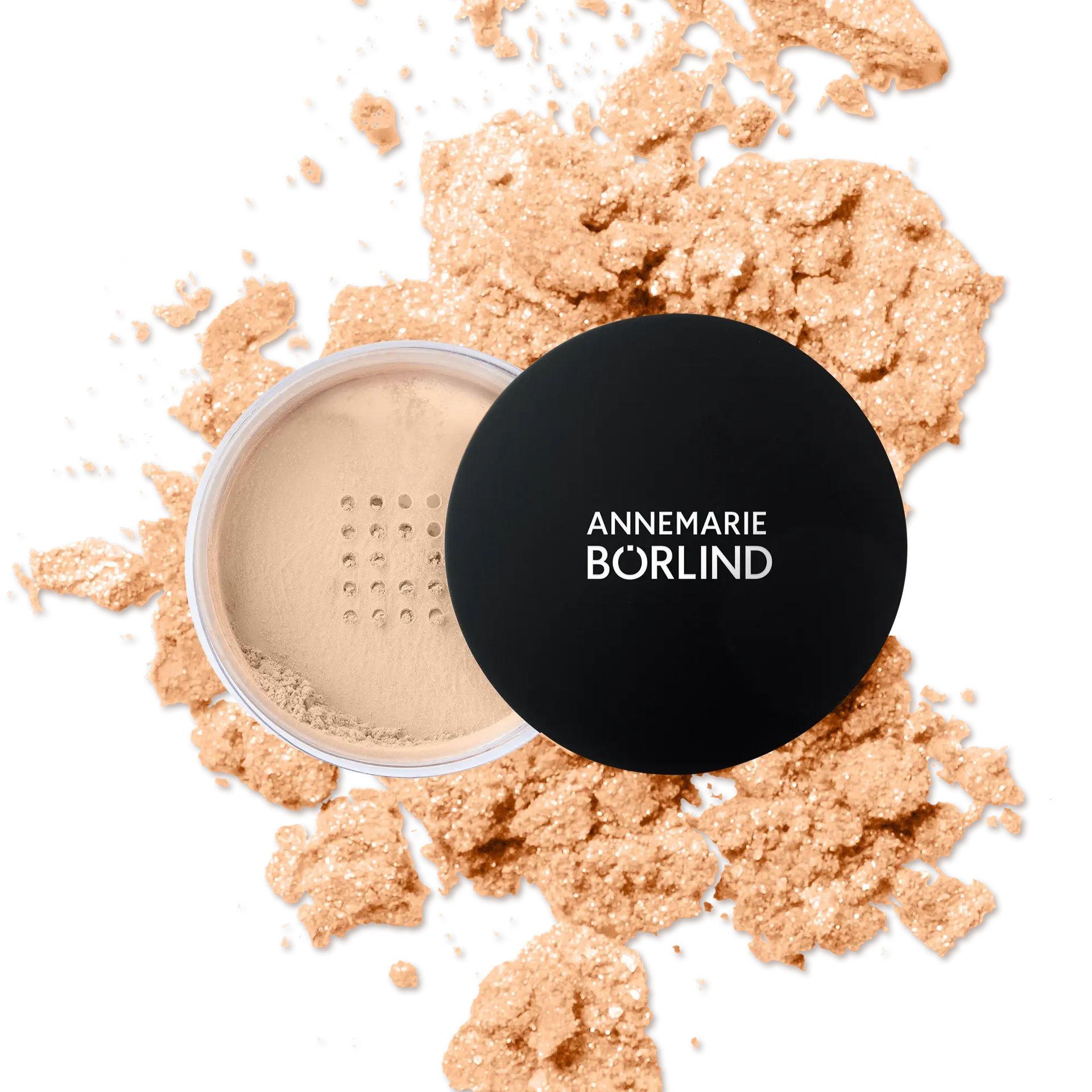 ANNEMARIE BÖRLIND lose Puder-Teint in heller Nuance mit schwarzem Deckel und verstreutem Puder