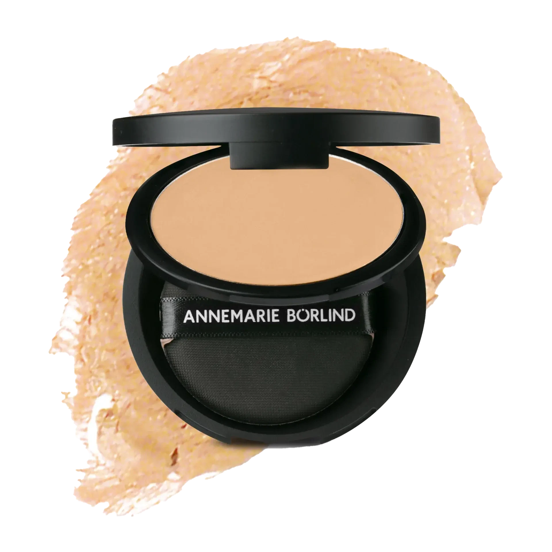 ANNEMARIE BÖRLIND Compact Make-up Light mit Schwämmchen vor beige Make-up-Farbklecks
