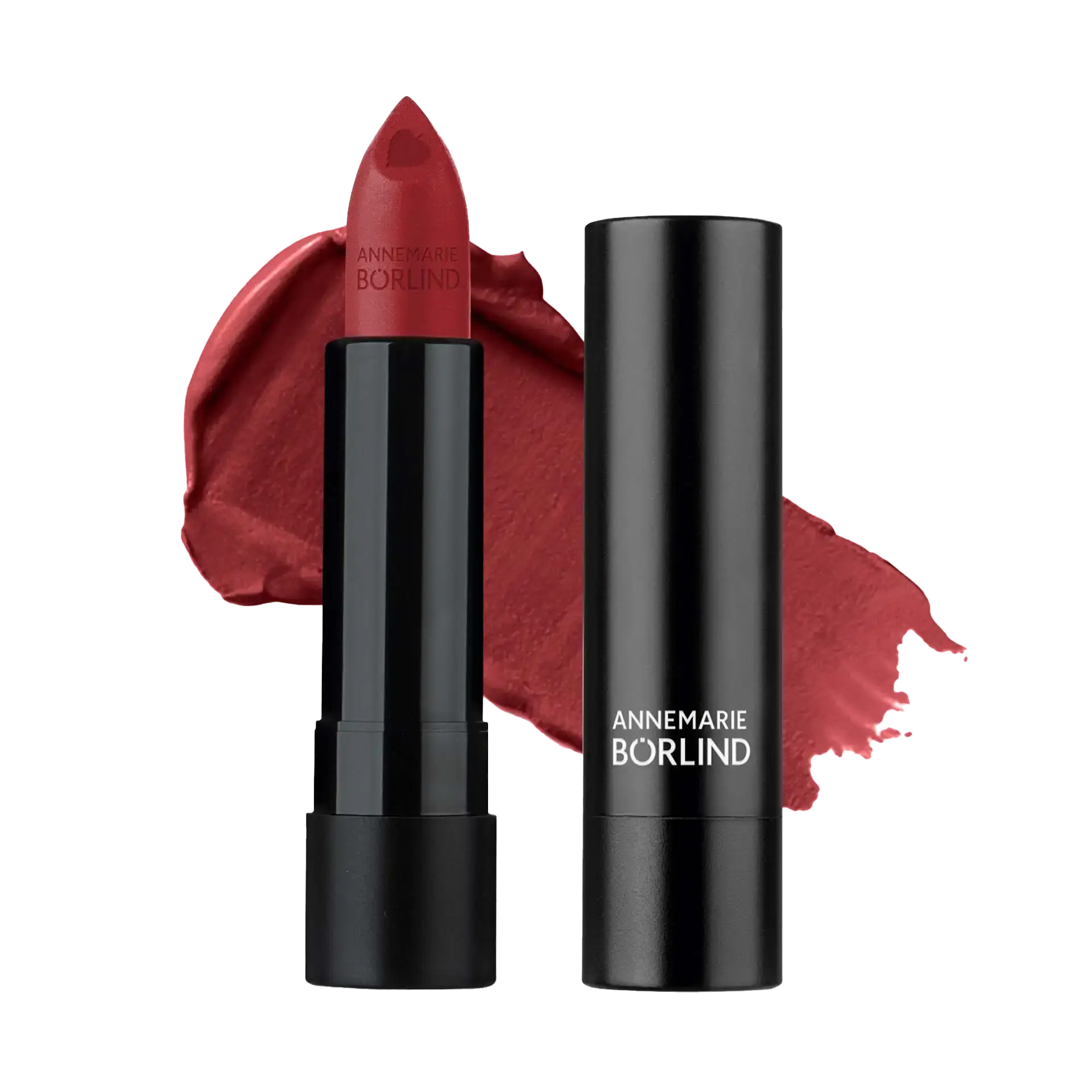 ANNEMARIE BÖRLIND Lippenstift in Burgund mit mattem Finish und schwarzer Hülse, Farbauftrag im Hintergrund