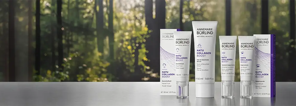 Natucollagen Boost Produkte vor Waldhintergrund