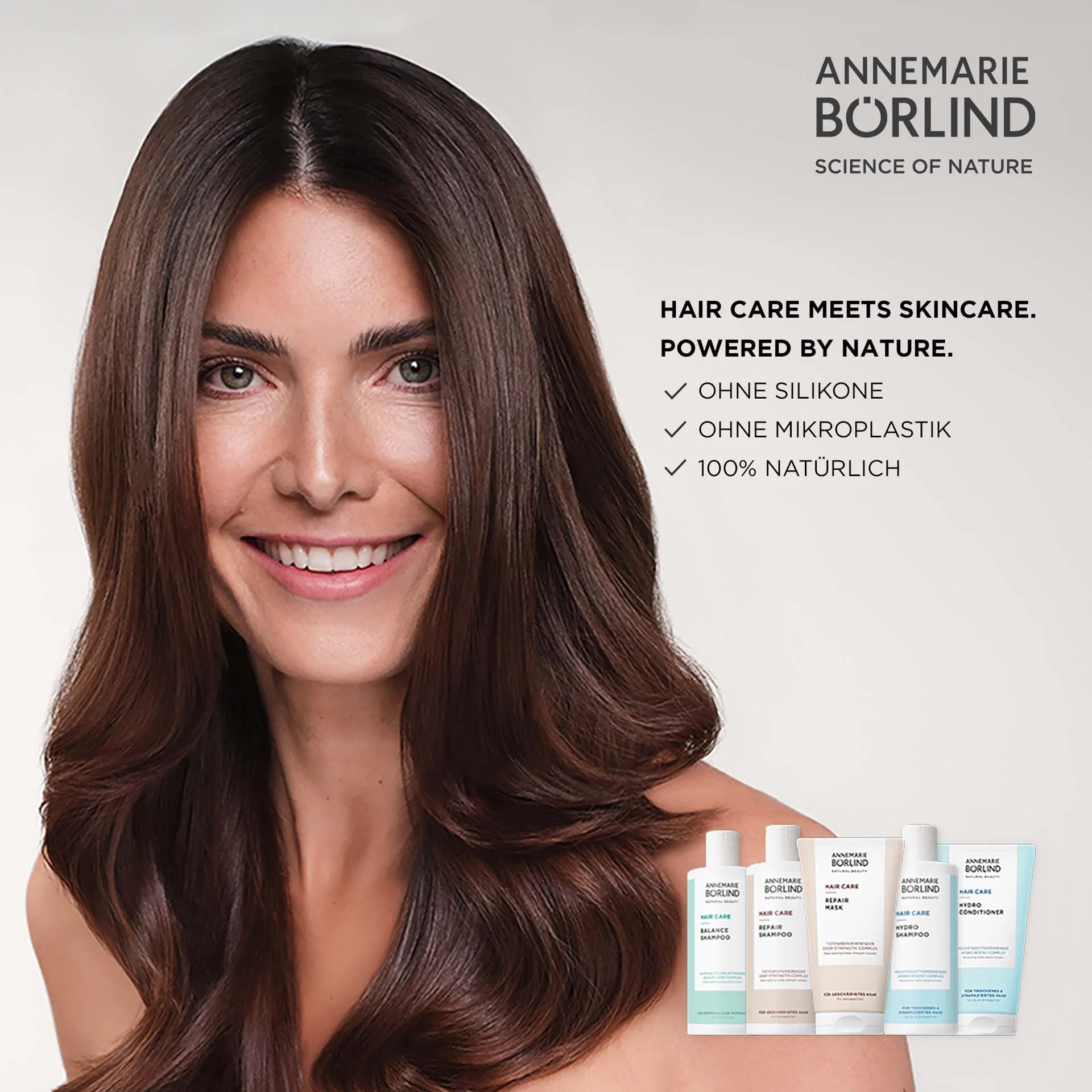 ANNEMARIE BÖRLIND Hair Care Serie mit Balance Shampoo, Hydro Conditioner, Hydro Shampoo, Repair Shampoo und Repair Mask mit Model im Hintergrund